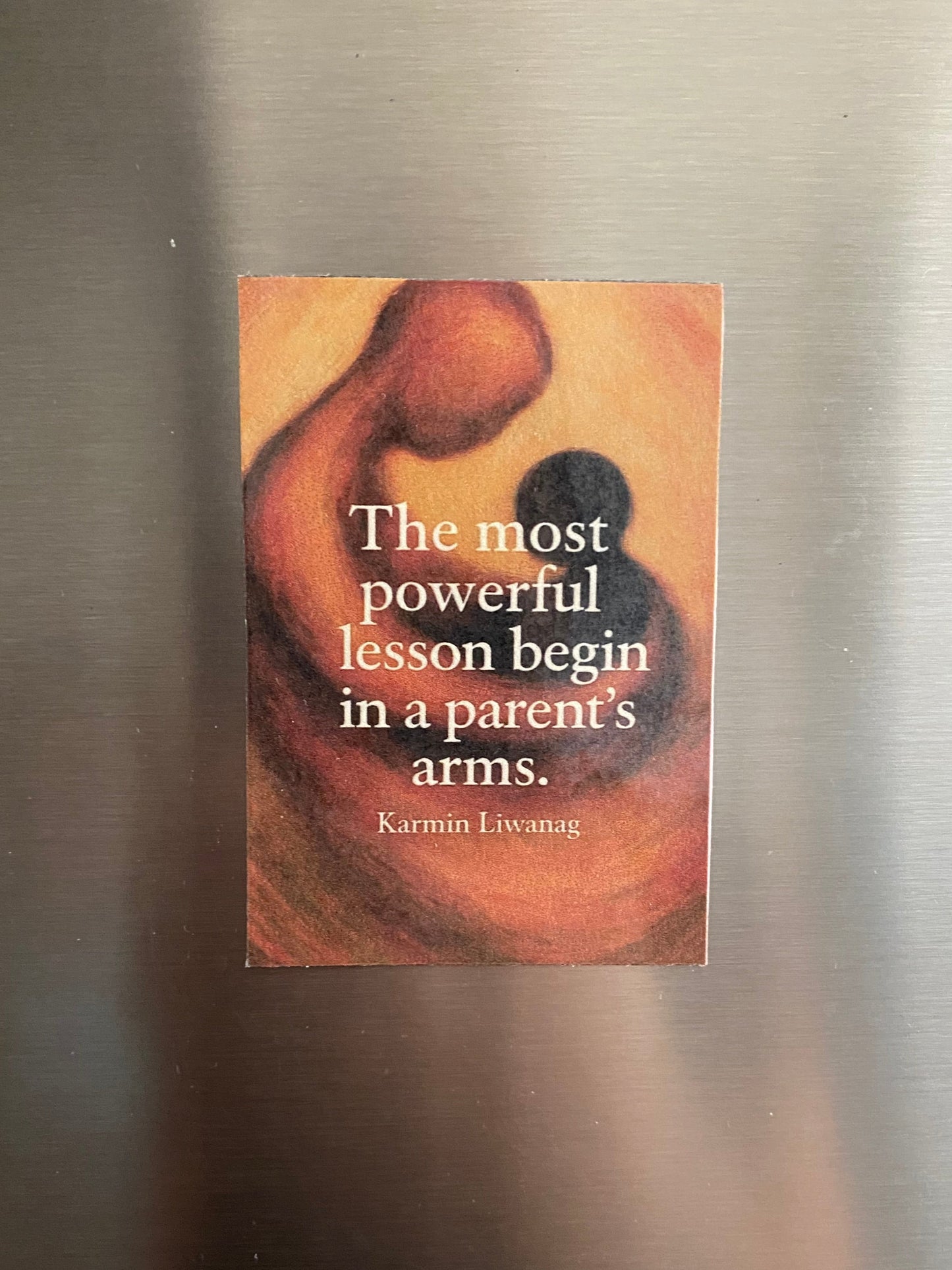 “In a Parent’s Arms” Quote Magnet – Laminated Finish